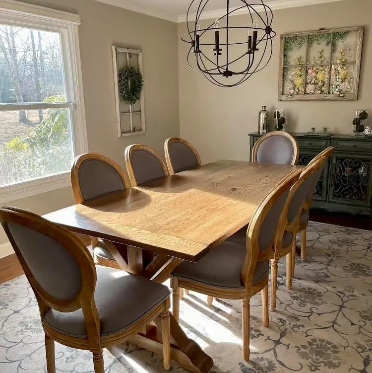 A hardwood dining table set for a formal Highland Park dining room