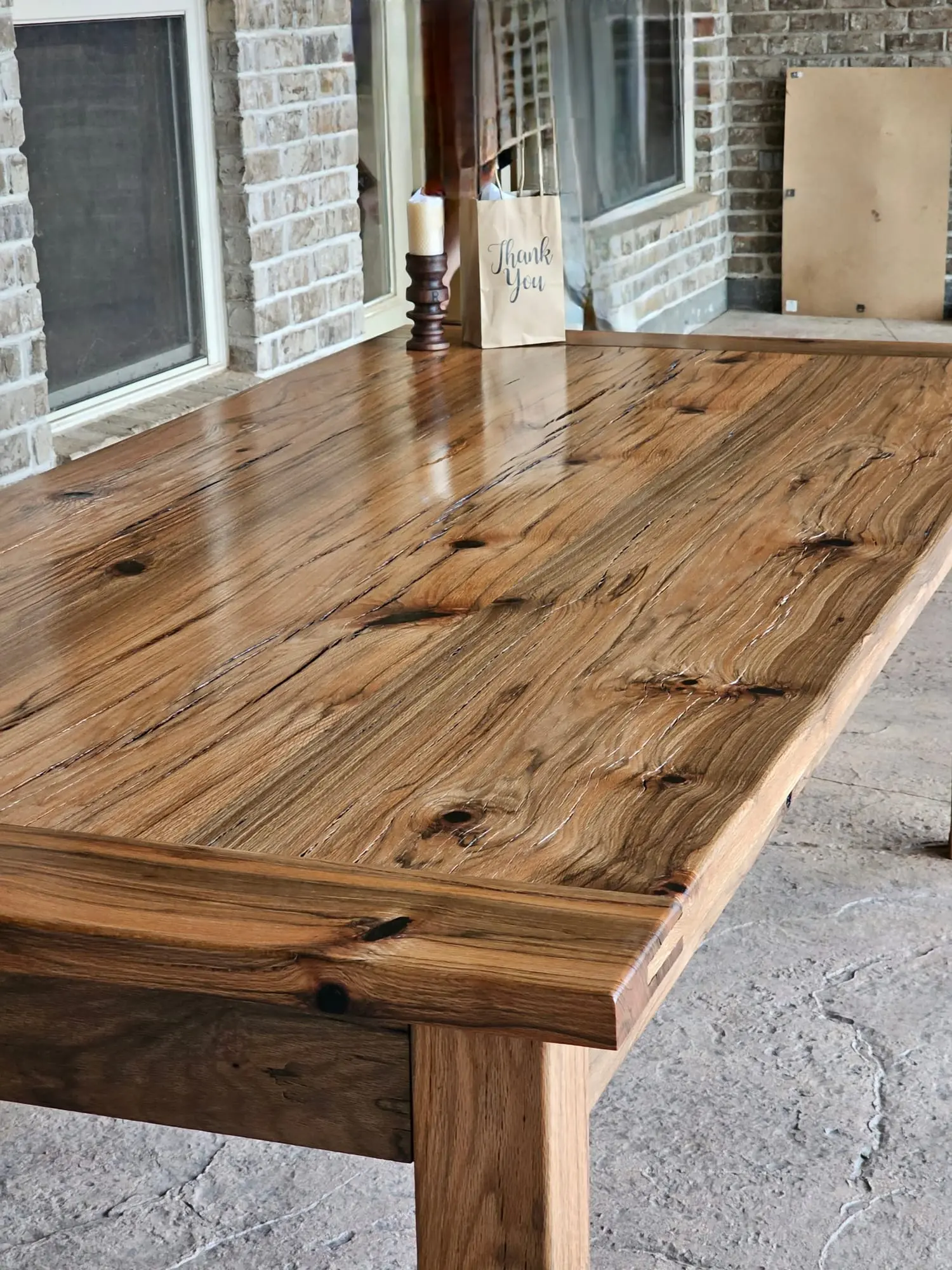 A rustic hardwood table top in the workshop