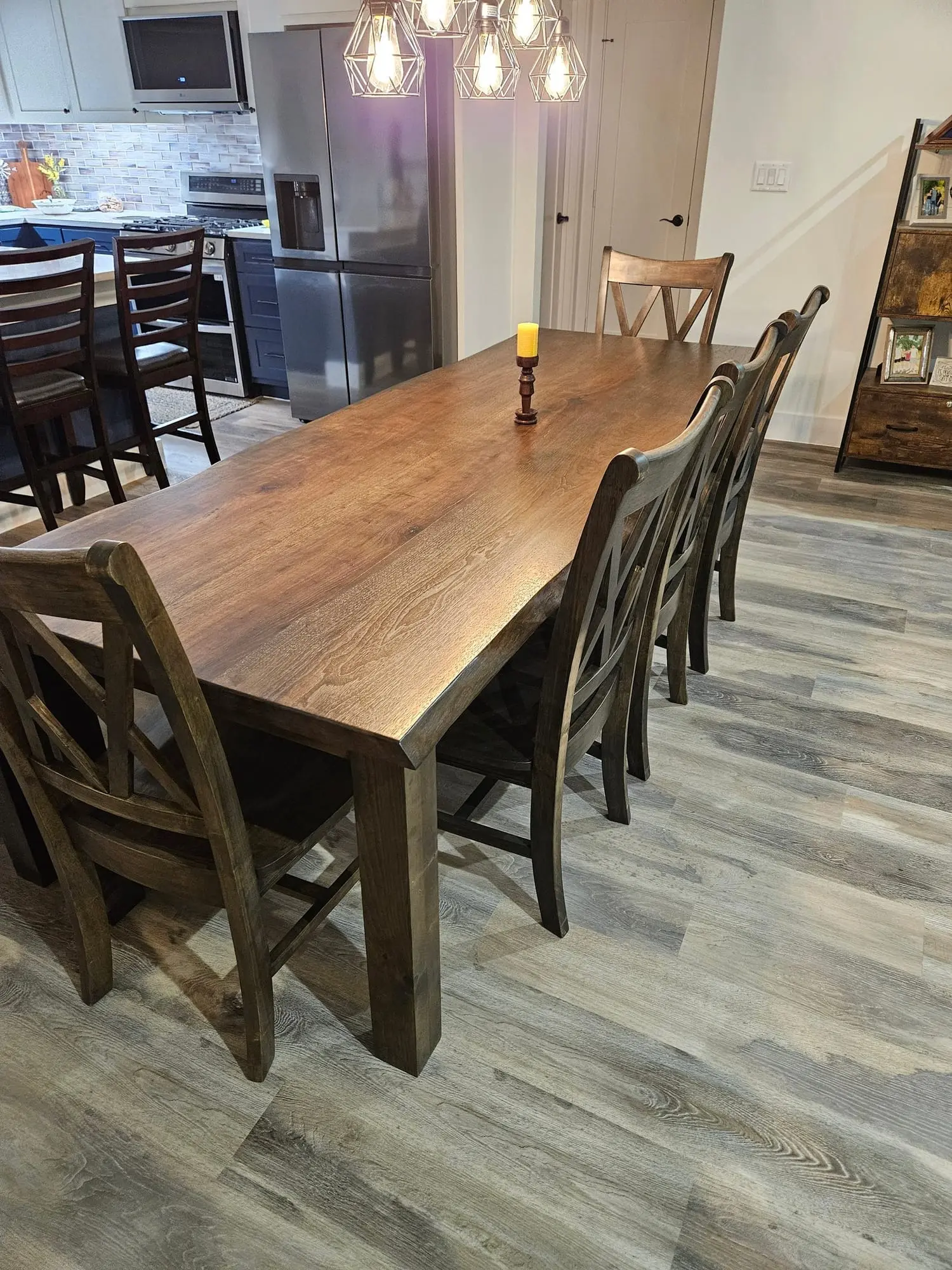 A live edge pecan dining table with chairs